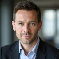 Professional headshot of Marcus Thorne, Lead Editor at ProEdit Solutions.